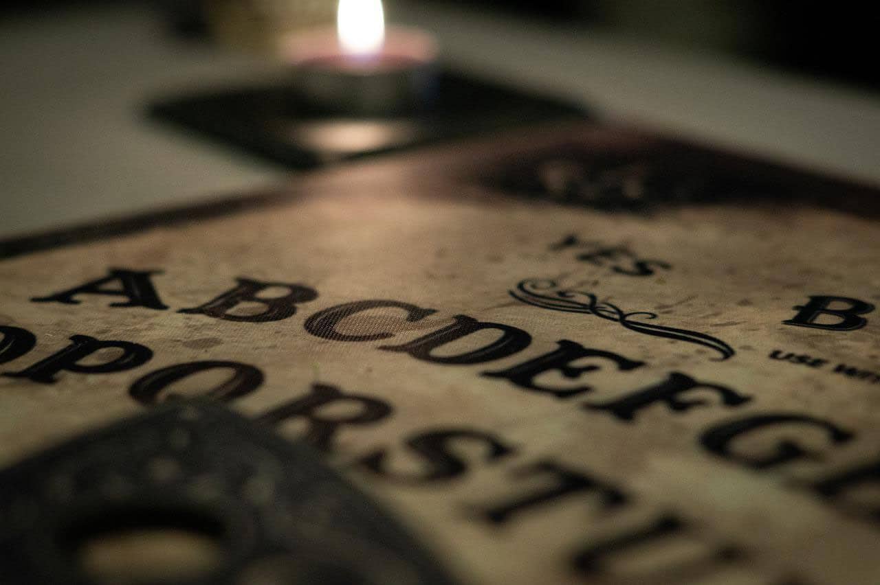 Contacting the Dead on Halloween with a Ouija Board